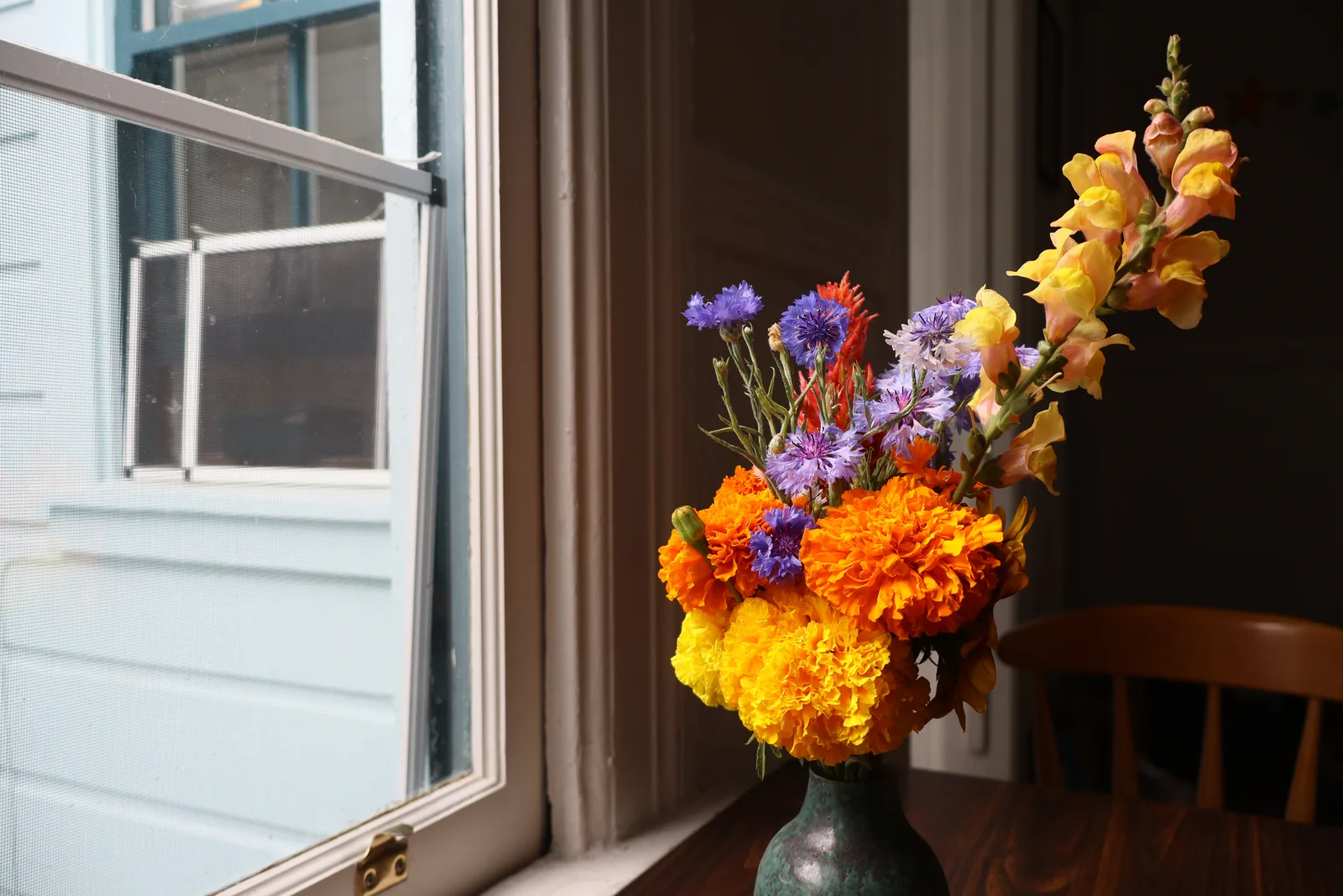 Blue vase floral arrangement