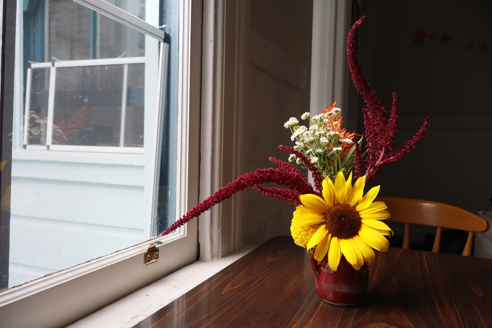 Red vase floral arrangement